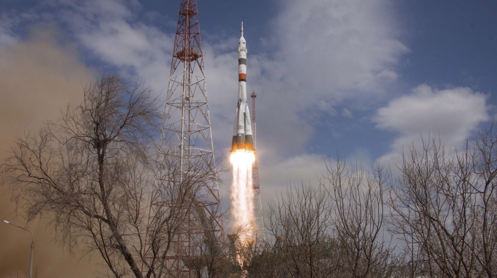 In this handout photo released by Roscosmos Space Agency Press Service the Soyuz-2.1A rocket booster with Soyuz MS-16 space ship carrying a new crew to the International Space Station, ISS, blasts off