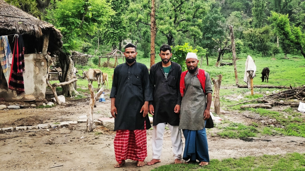 The brothers Mir Hamza, Yusuf, Mohammad Alim outside their home