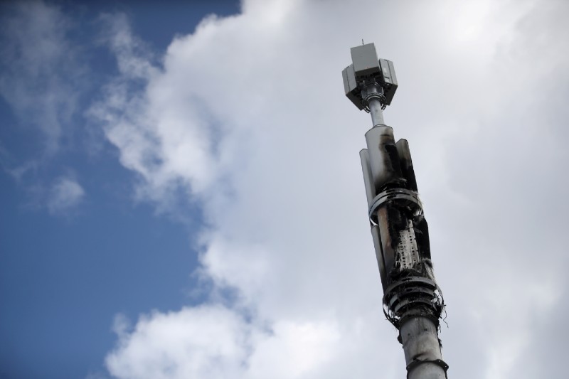 Telecommunications masts in the UK have been vandalised, such as this one damaged by fire in Sparkhill, Birmingham, amid conspiracy theories linking the coronavirus disease and 5G masts
