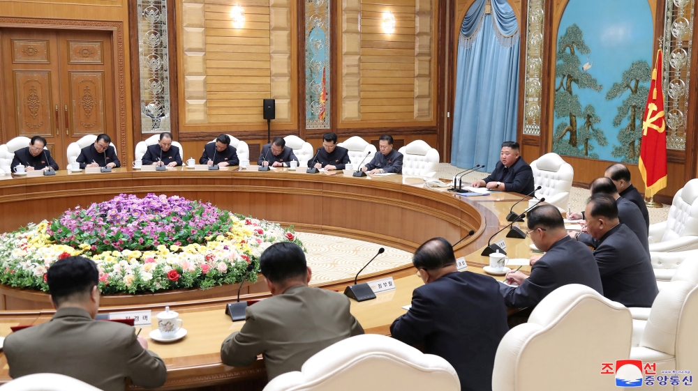 North Korean leader Kim Jong Un takes part in a meeting of the Political Bureau of the Central Committee of the Workers' Party of Korea