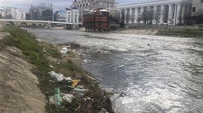 Recyclable plastic litters the banks of the Vardar River as in winds through the center of Skopje, in the shadow of government buildings and major tourist centres