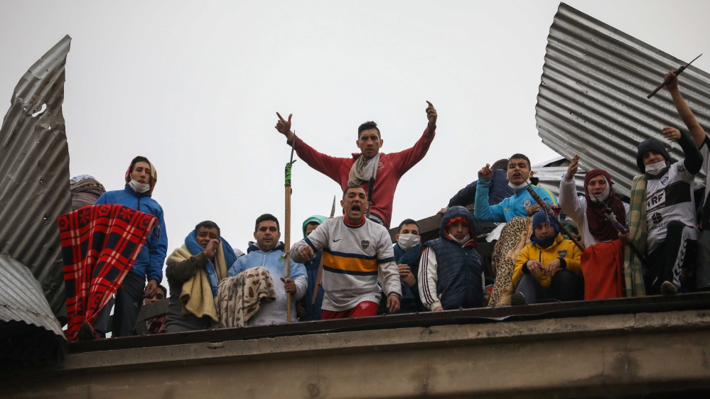 Rioting inmates gathered on the roof of the Villa Devoto prison during a protest against authorities, saying they are not doing enough to prevent the spread of coronavirus in Buenos Aires, Argentina