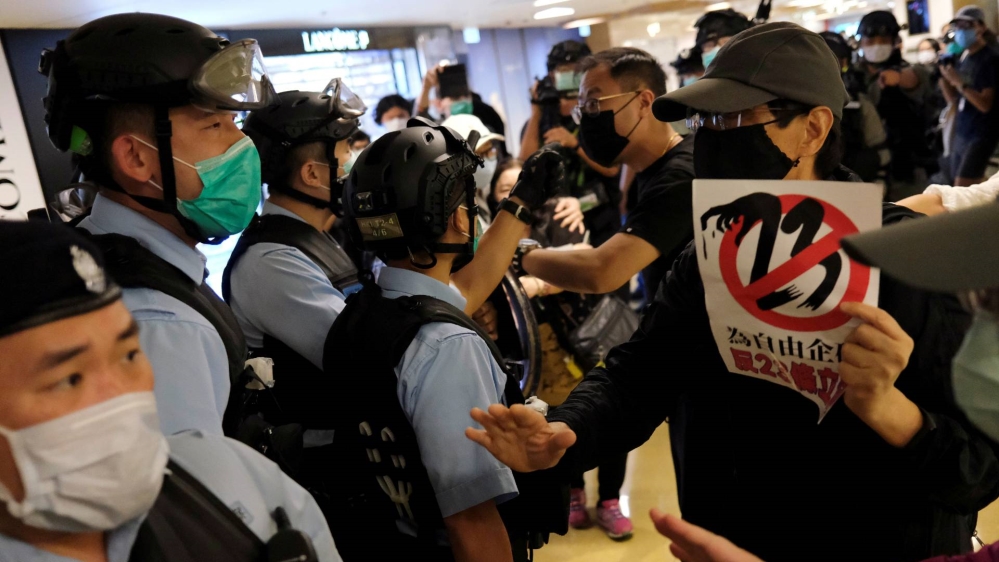 Amid the coronavirus pandemic, protesters defied social distancing regulations in Hong Kong to demonstrate against the government on Sunday