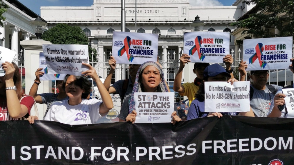 Members of the National Union of Journalists of the Philippines (NUJP) demonstrate in support of press freedom, in front of the Supreme Court in Manila