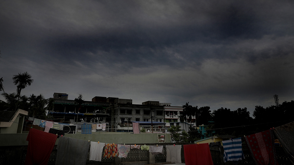 epa08431146 Dense rain clouds gather in the sky as Cyclone Amphan gathers strength in the Bay of Bengal; in Kolkata, India, 19 May 2020. The Odisha government and Bengal government are considering the