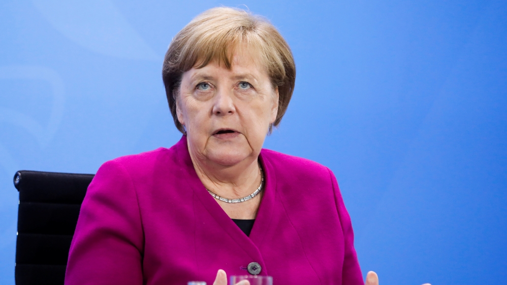 German Chancellor Angela Merkel briefs the media after a meeting with German federal state governors at the Chancellery in Berlin