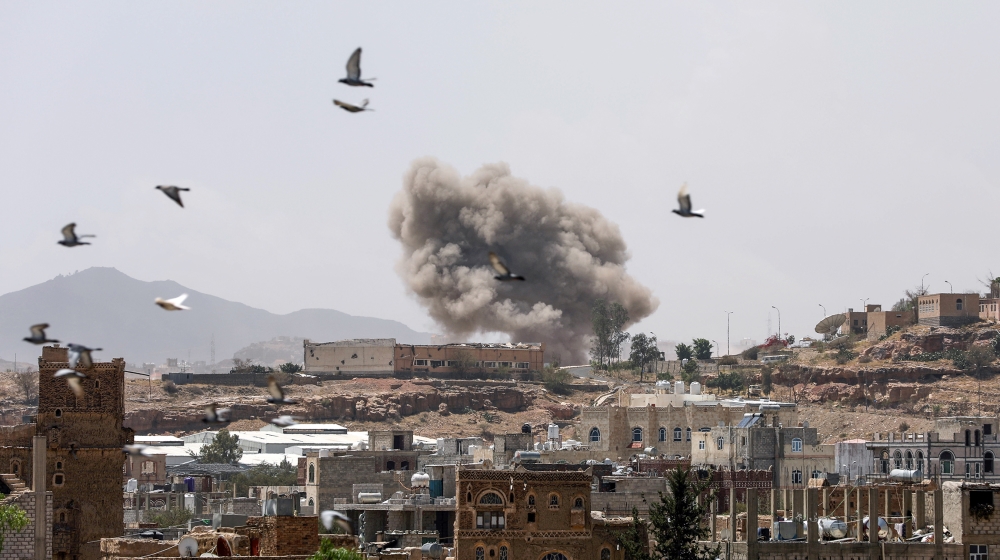 Dust rises from the site of a Saudi-led air strike in Sanaa, Yemen March 30, 2020. REUTERS/Khaled Abdullah