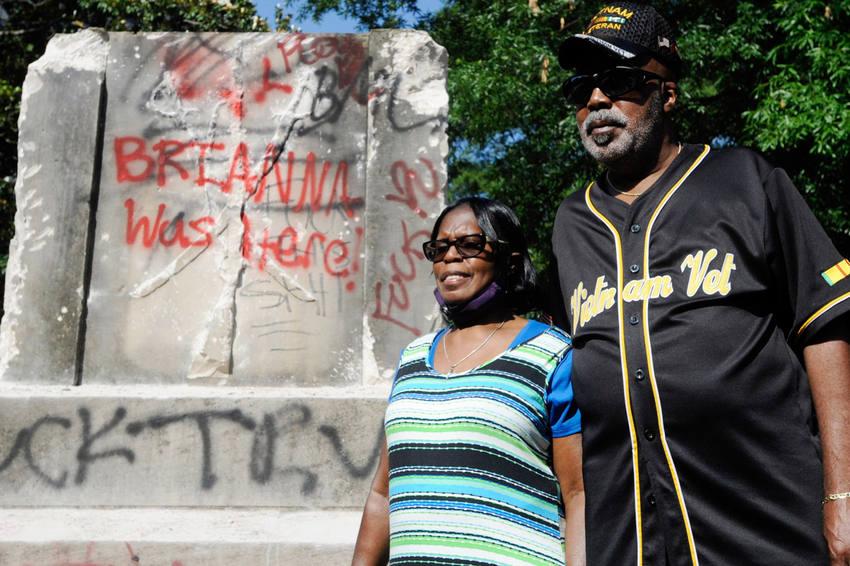 EDS NOTE: OBSCENITY - Sarah Collins Rudolph, who survived a racist church bombing that killed sister Addie Mae Collins and three other girls in 1963, stands with husband George Rudolph at the remains