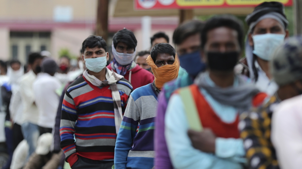kashmir migrant workers masks srinagar india