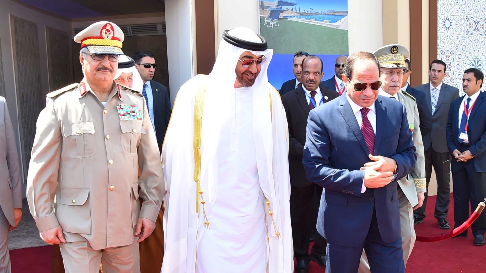 Egyptian President Abdel Fattah al-Sisi arrives with Arab leaders at the opening of the Mohamed Najib military base at El Hammam City in Egypt