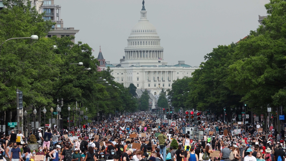 Demonstrators march from the US Capitol building during a protest against racial inequality after the death in Minneapolis police custody of George Floyd, in Washington, US