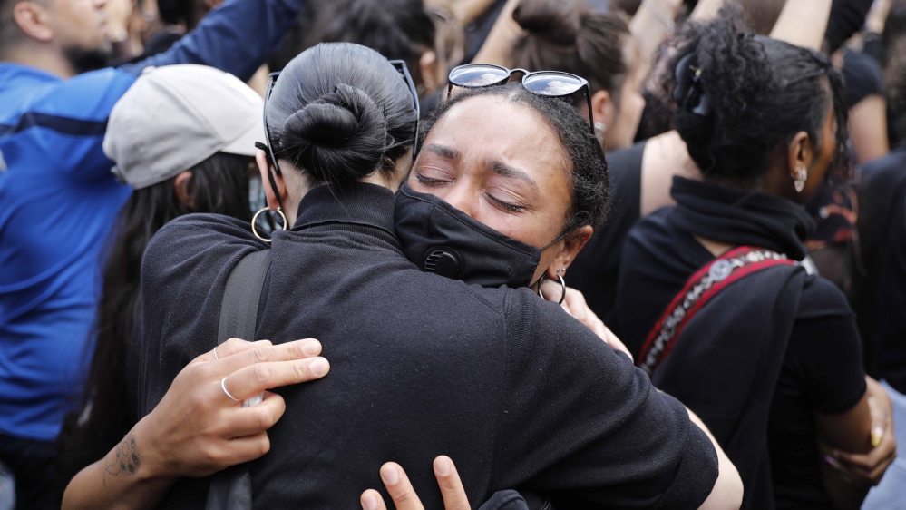 Women hug