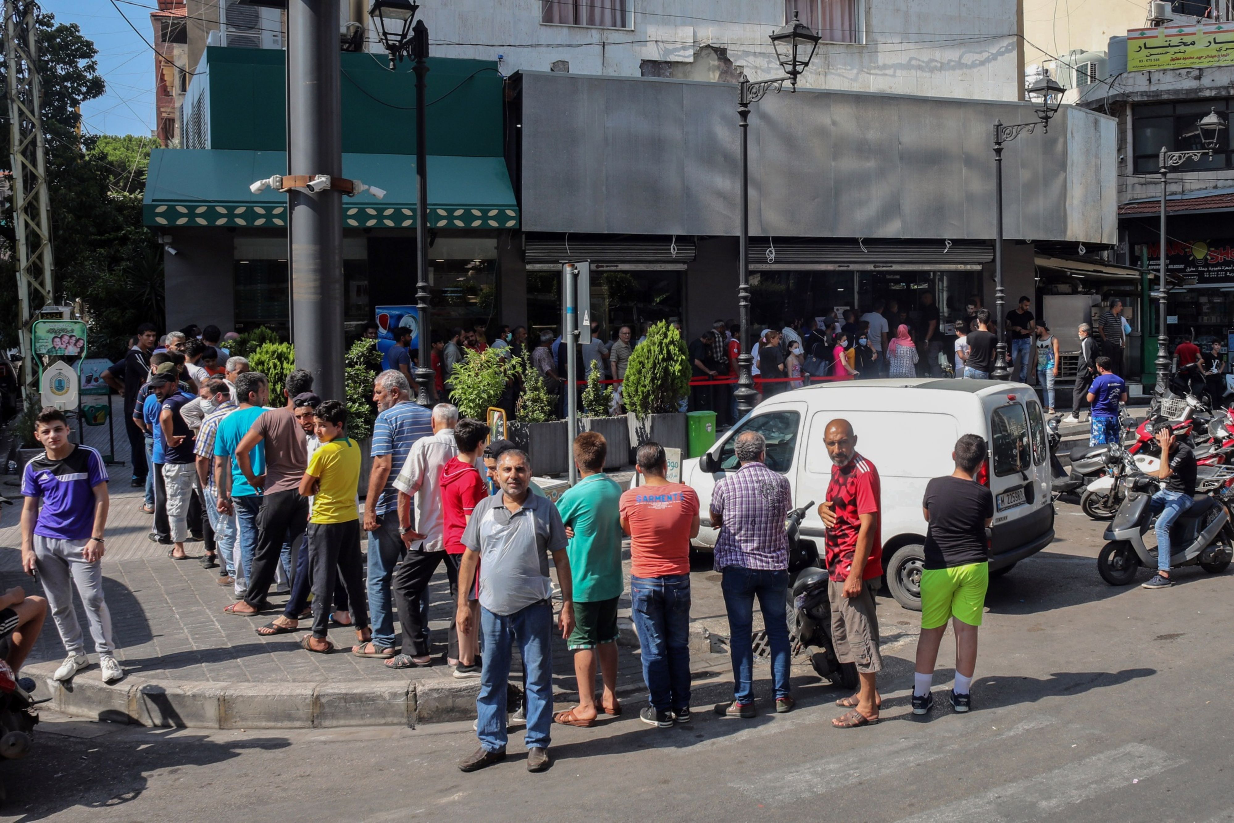 Crowds wait to buy bread in Beirut, Lebanon, where officials pledged to stabilise soaring prices