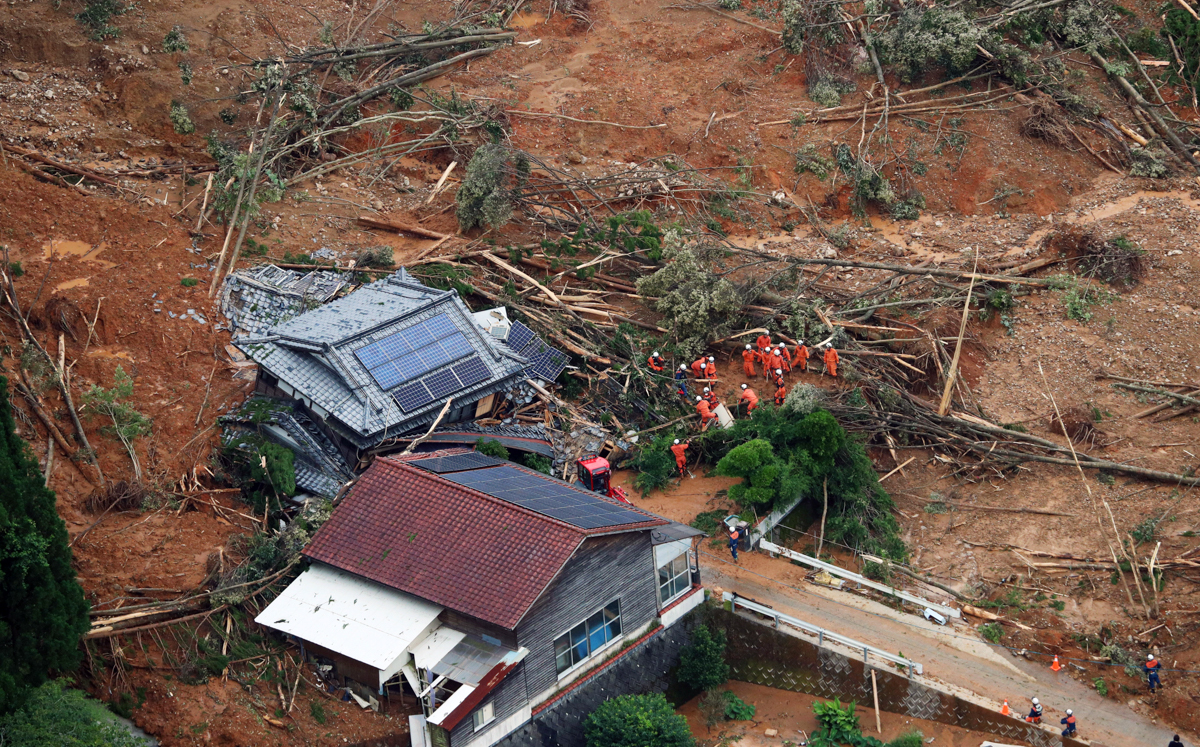 epaselect epa08526688 An aerial view shows rescue operations in Ashikita, Kumamoto prefecture, southwestern Japan, 04 July 2020. Local authorities asked the evacuation of more than 200,000 residents i
