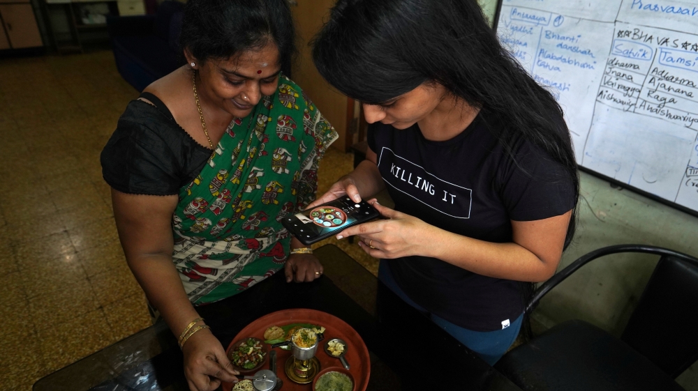 Geetha Sridhar, 54, who used to post many videos on TikTok, makes a miniature cooking video with her daughter Sarada