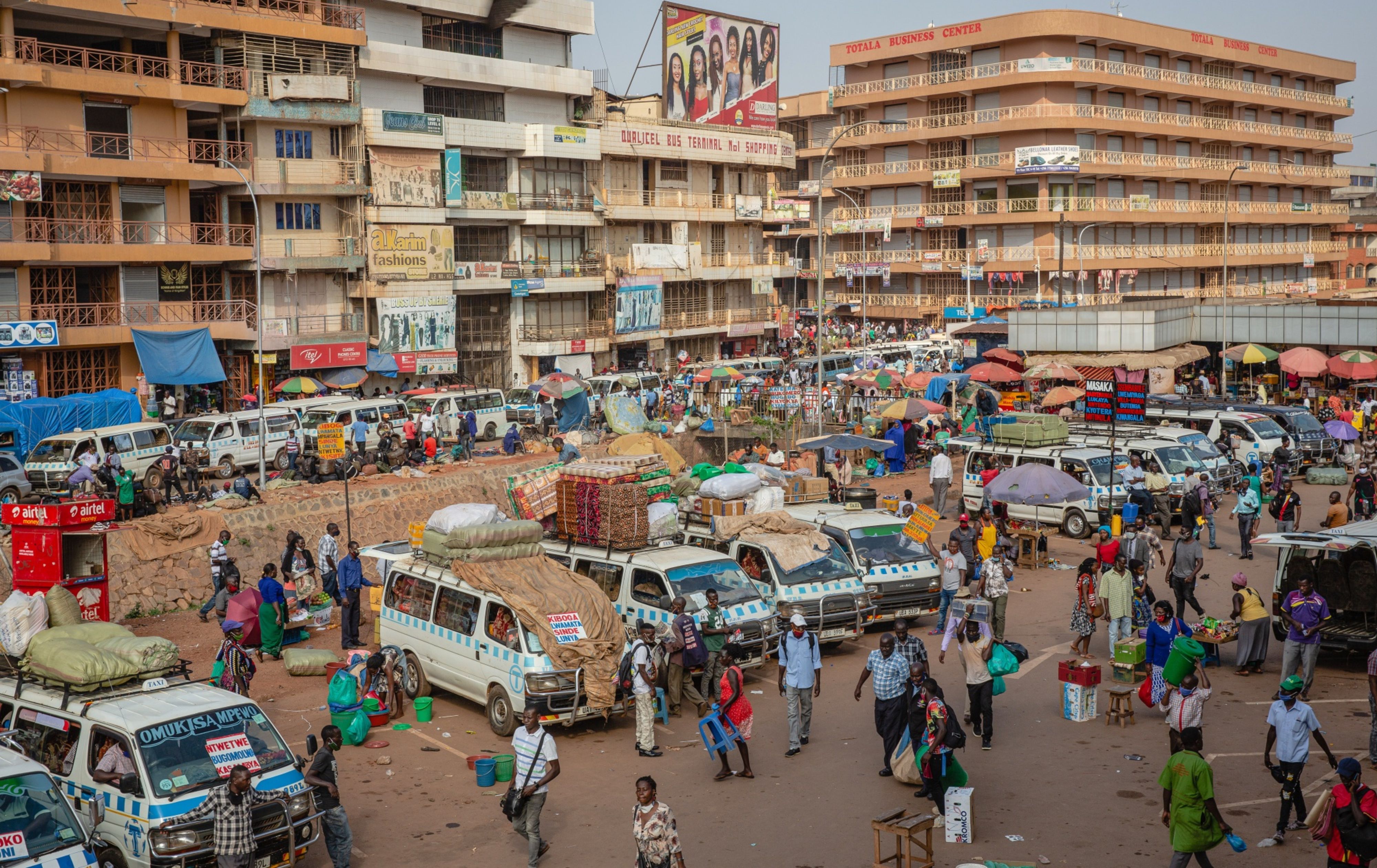 Taxi vans in Kampala, Uganda, which enforced pandemic restrictions for two months