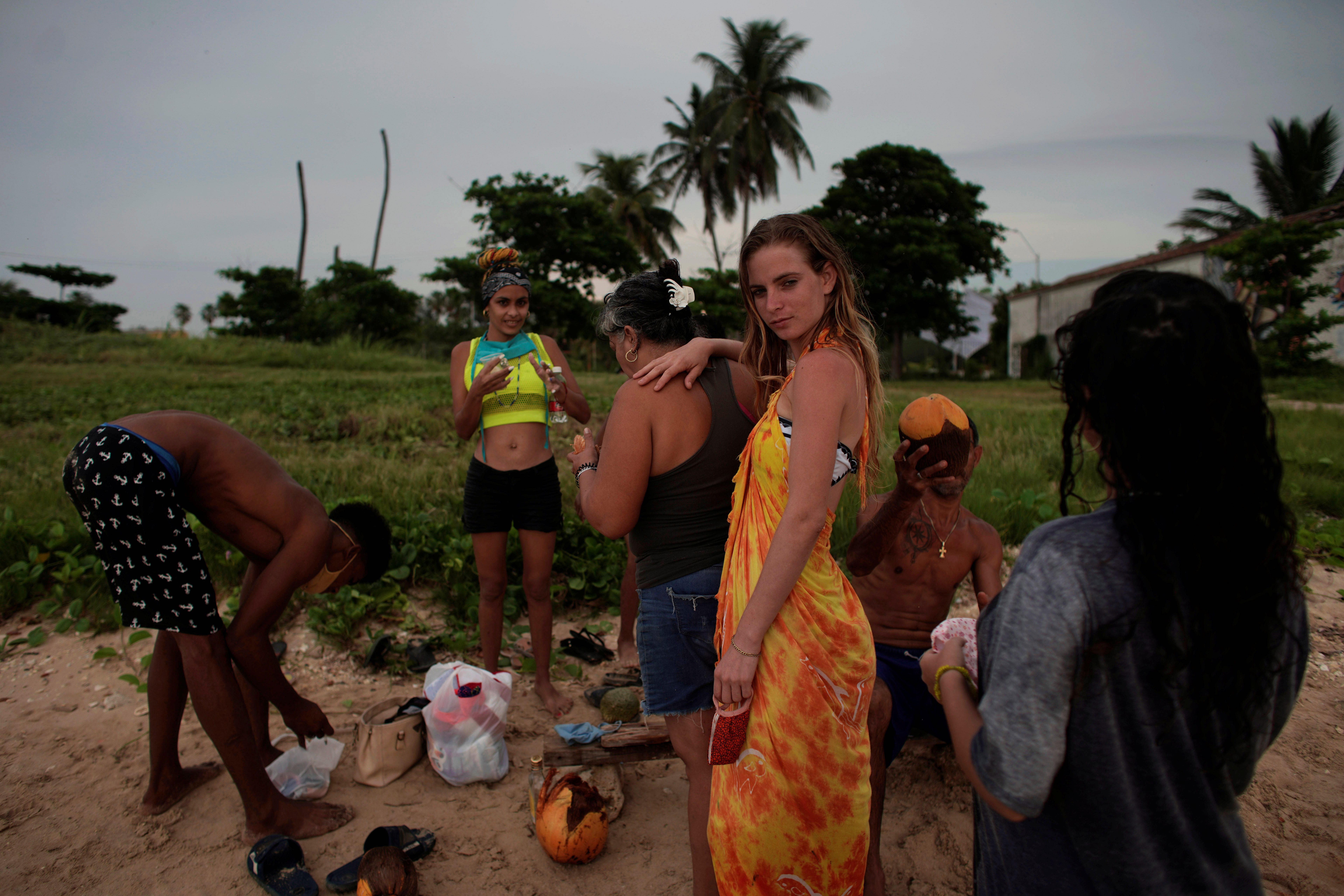 A family enjoys the beach amid concerns about the spread of the coronavirus in Havana, Cuba
