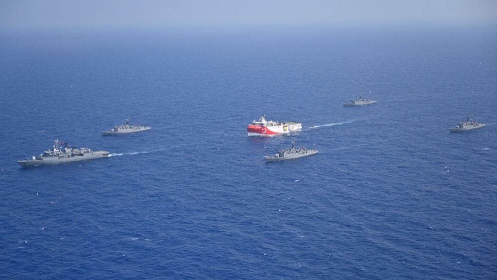 Turkish seismic research vessel Oruc Reis is escorted by Turkish Navy ships as it sets sail in the Mediterranean Sea, off Antalya, Turkey, August 10, 2020 [Turkish defence ministry handout via Reuters]