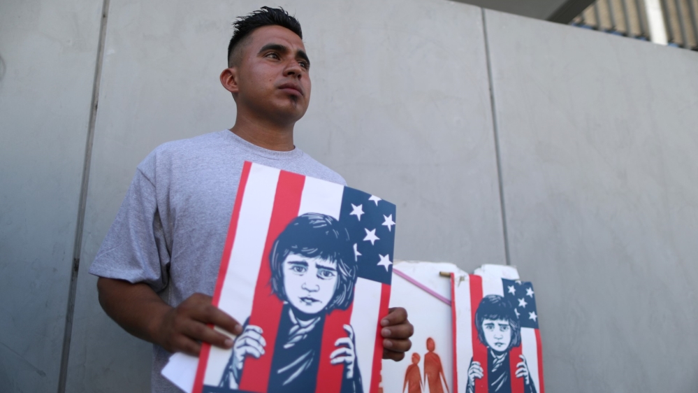 Asylum seeker and former immigrant detainee Mateo Lemus Campos attends a protest against conditions in Adelanto Immigration Detention Center, outside ICE headquarters in Los Angeles, California