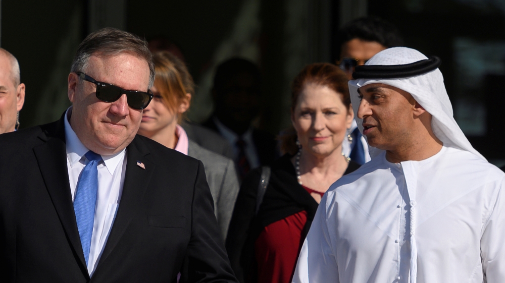 US Secretary of State Mike Pompeo speaks with the Emirati Ambassador to the US Yousef Al Otaiba at the NYU Abu Dhabi campus in Abu Dhabi, United Arab Emirates January 13, 2019.  Andrew Caballero-Reyno