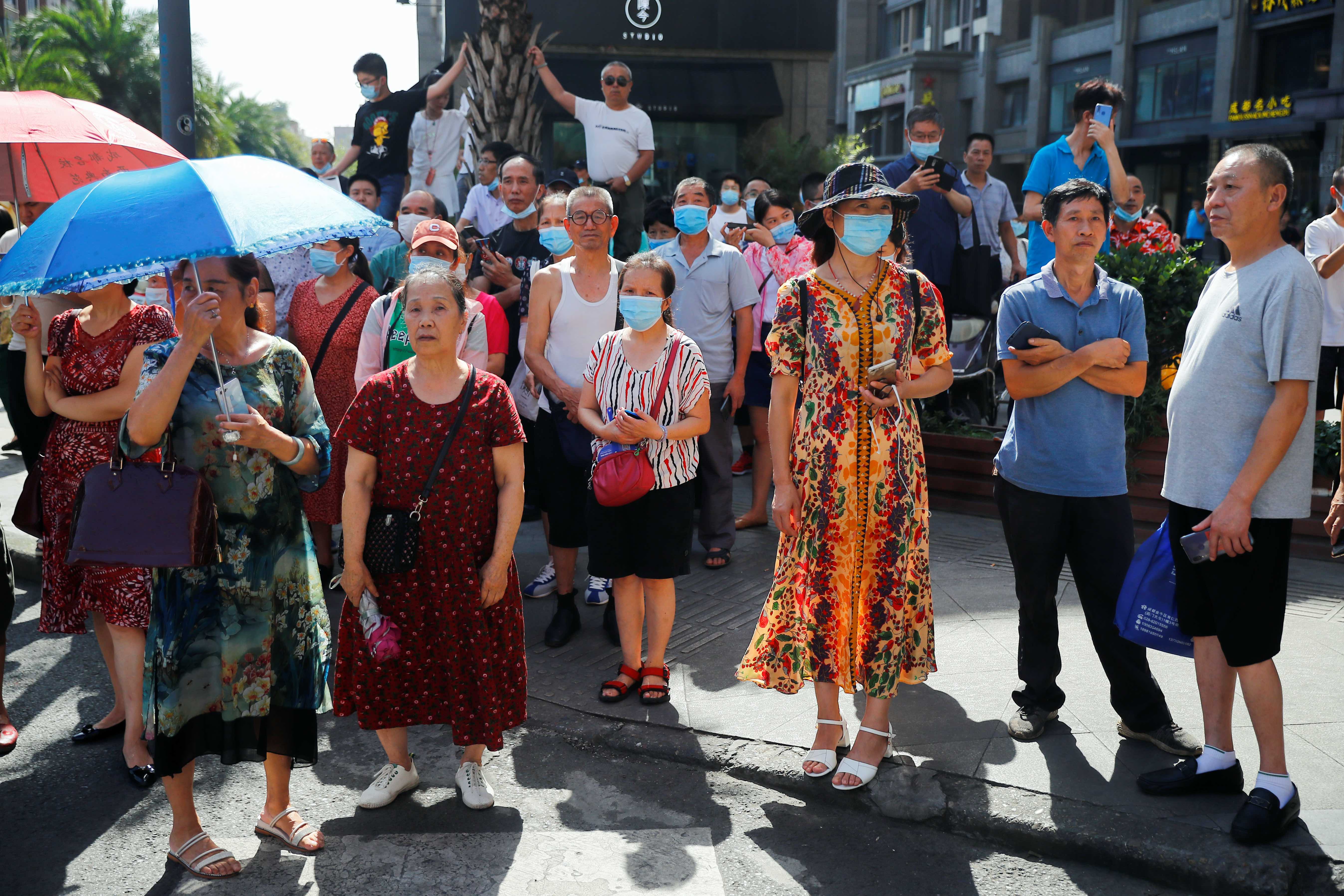 People gather near the US Consulate General in Chengdu, Sichuan province, China, last week as the final group of US personnel prepared to leave the consulate after China ordered its closure in response to a US order for China to shut its consulate in Houston