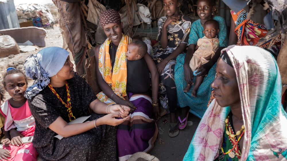 Talaso, left, often runs mother/daughter forums where she educates them about the risks of FGM and early marriage