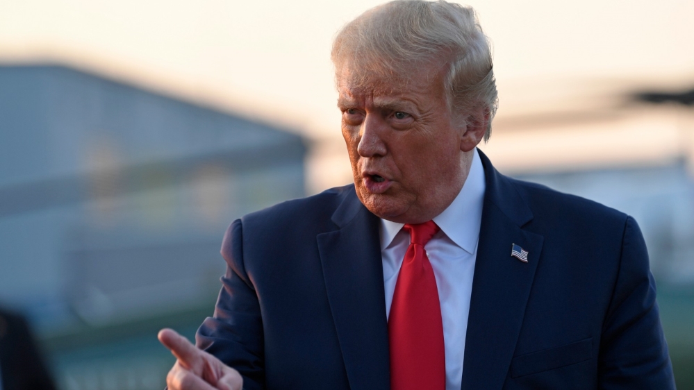 Trump points