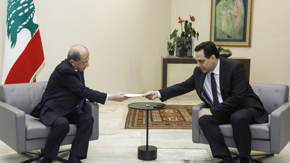 Lebanon's Prime Minister Hassan Diab submits his resignation to Lebanon's President Michel Aoun at the presidential palace in Baabda, Lebanon August 10, 2020. Dalati Nohra/Handout via REUTERS ATTENTIO