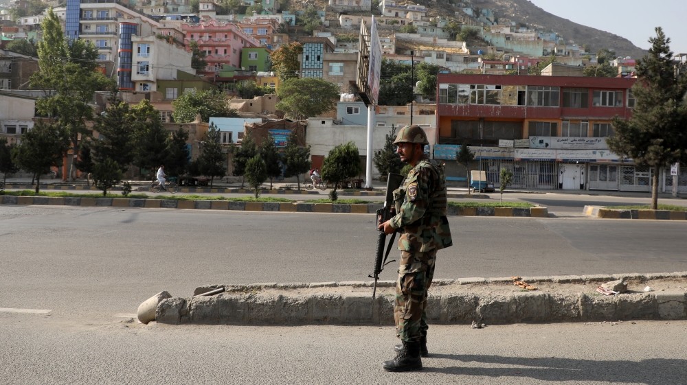 An Afghan National Army (ANA) soldier keeps watch at the area where the Loya Jirga holding in Kabul, Afghanistan