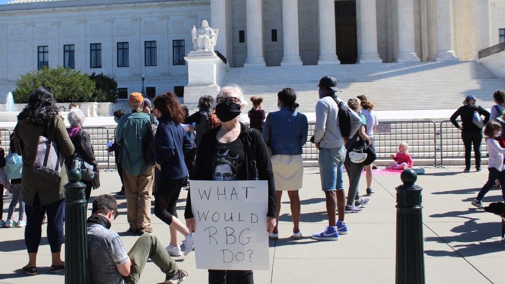 Baltimore teacher Kelli Midgley, centre, said Ginsburg acted as the country’s moral compass