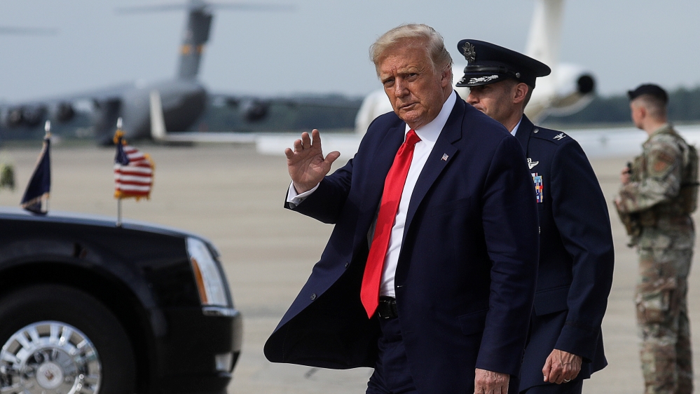 Trump waves
