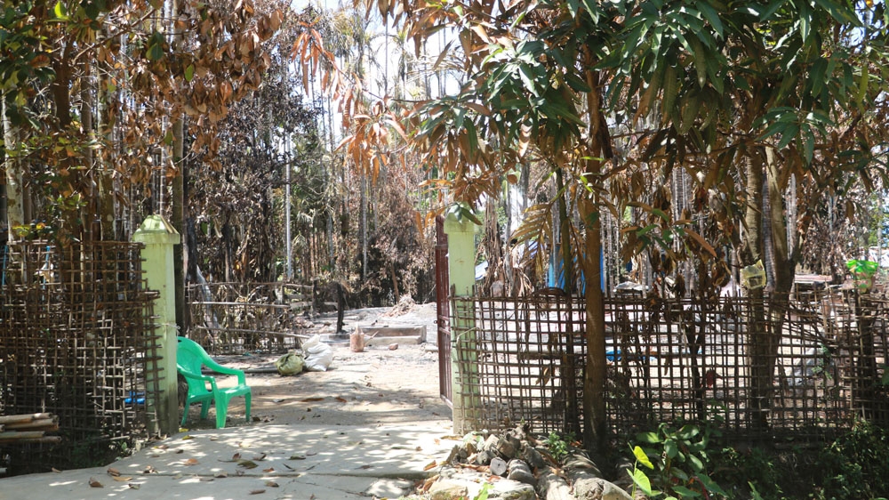 The remains of a burned home in Hpa Yar Paung village in Kyauktaw township, Rakhine State, after overnight violence on Sept 3. Villagers say they are more concerned about the military than the coronavirus