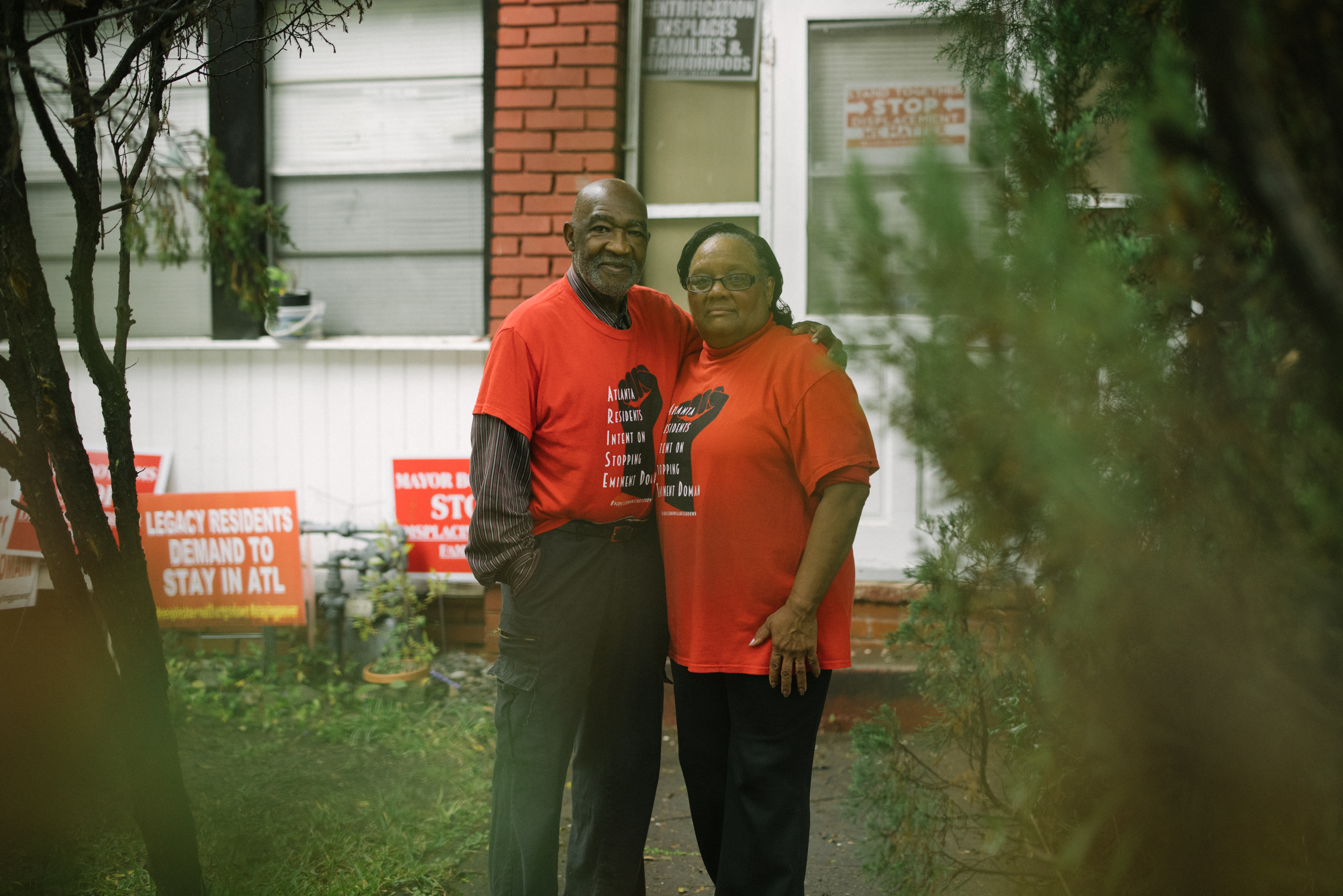 Robert and Bertha Darden in front of their home