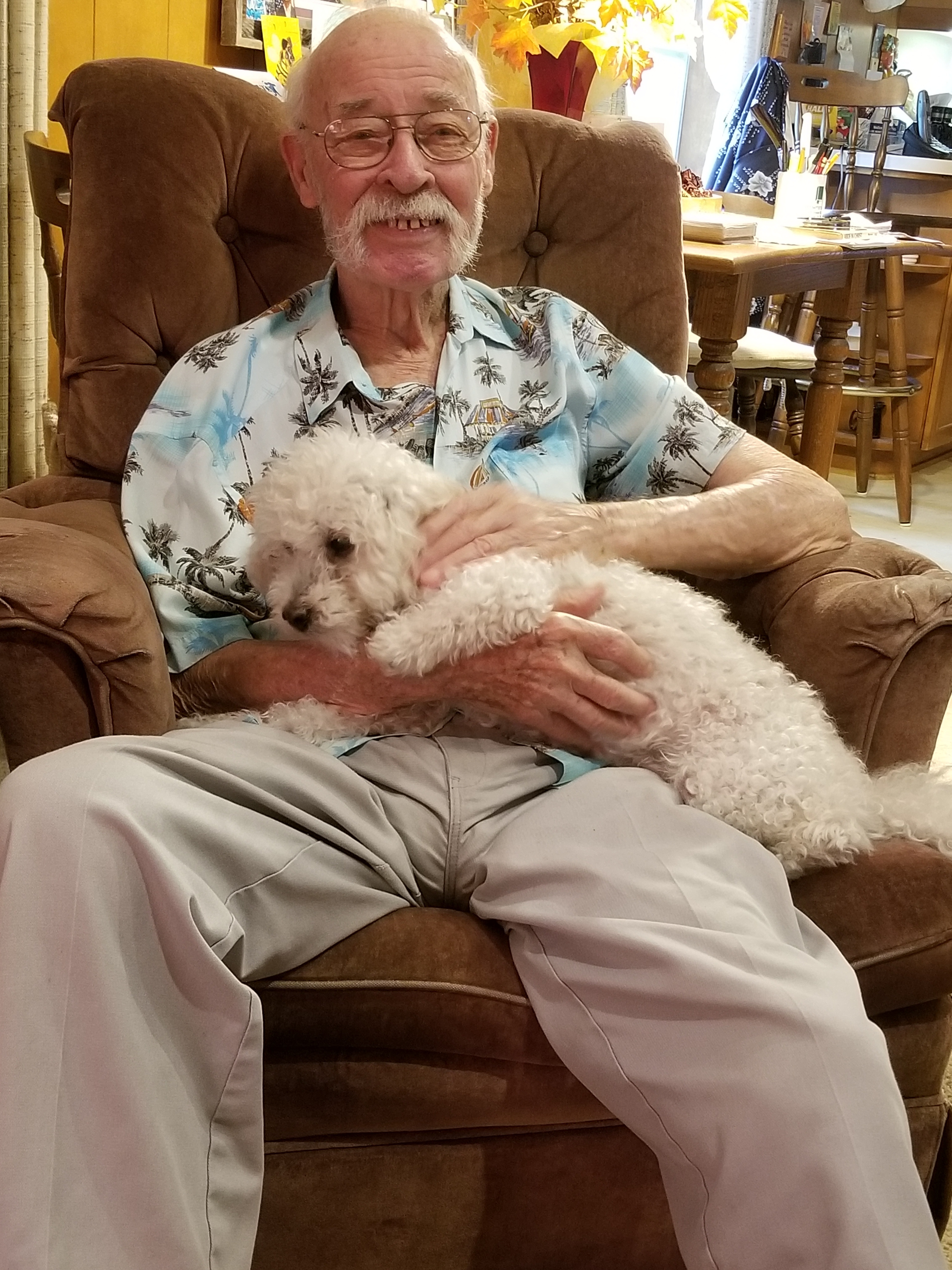 Richard and Meghan’s dog, Wilbur, who loves to snuggle with Richard [Photo courtesy of Meghan Beaudry]