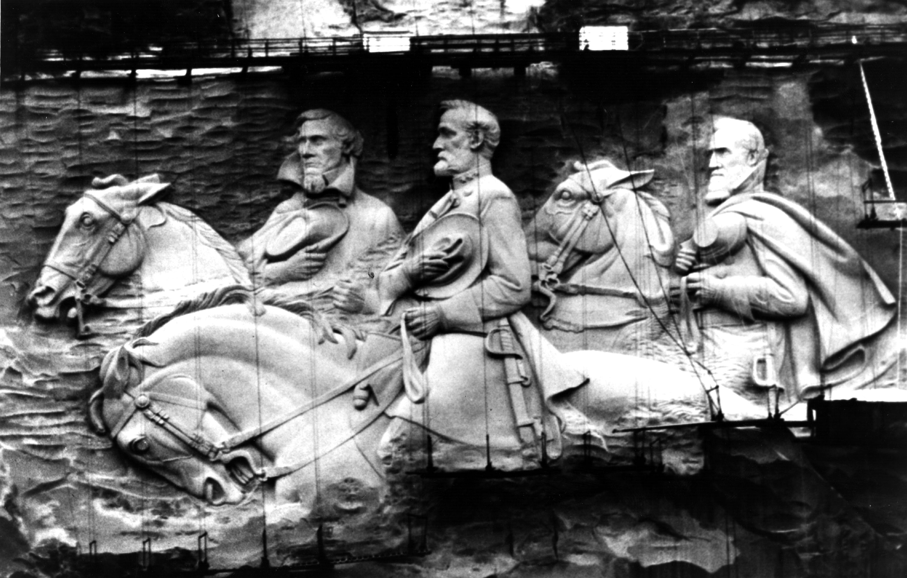 Giant figures sculpted on Stone Mountain, Atlanta, Georgia, show Jefferson Davis, the only president of the Confederate States of America with Confederate Generals Robert E Lee and Stonewall Jackson