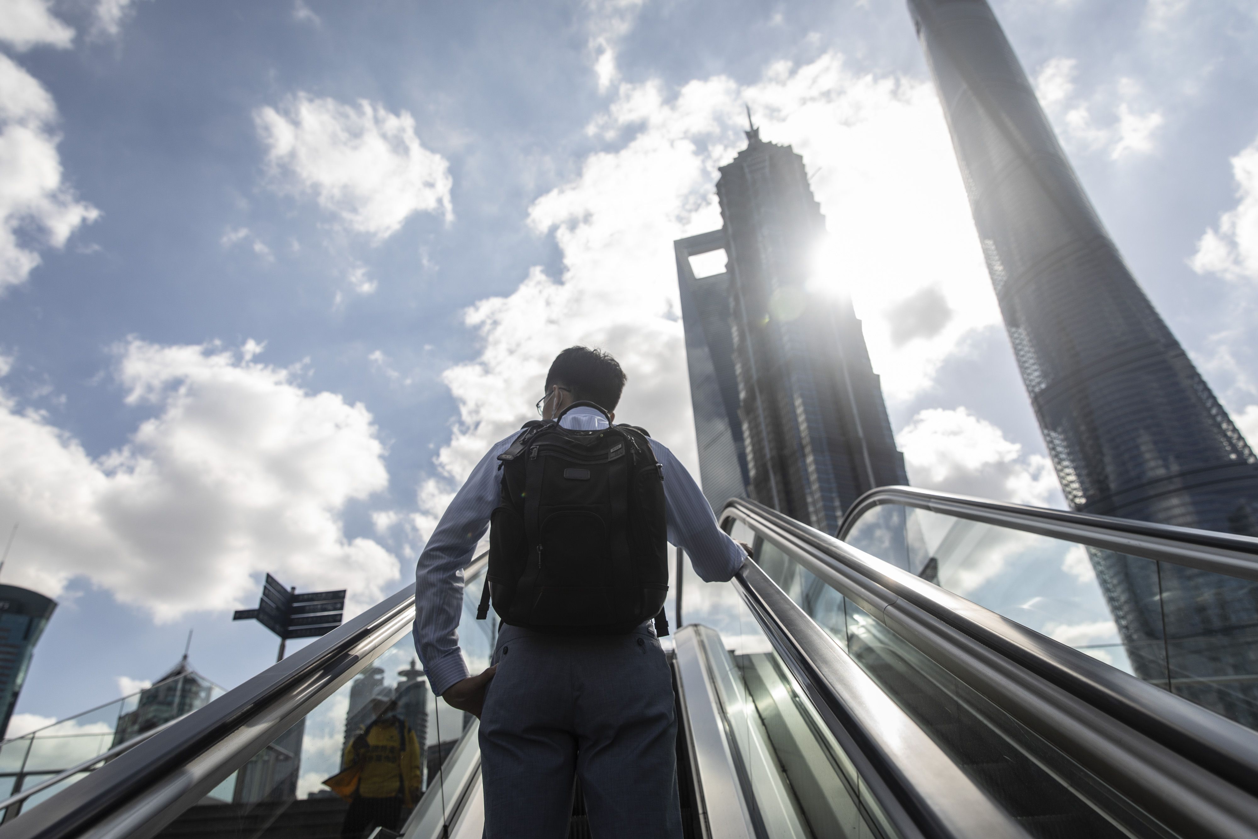 By 2025, China will rank 70th in the world on the per capita income metric, putting it close to joining the richest one-third of nations [File: Bloomberg]