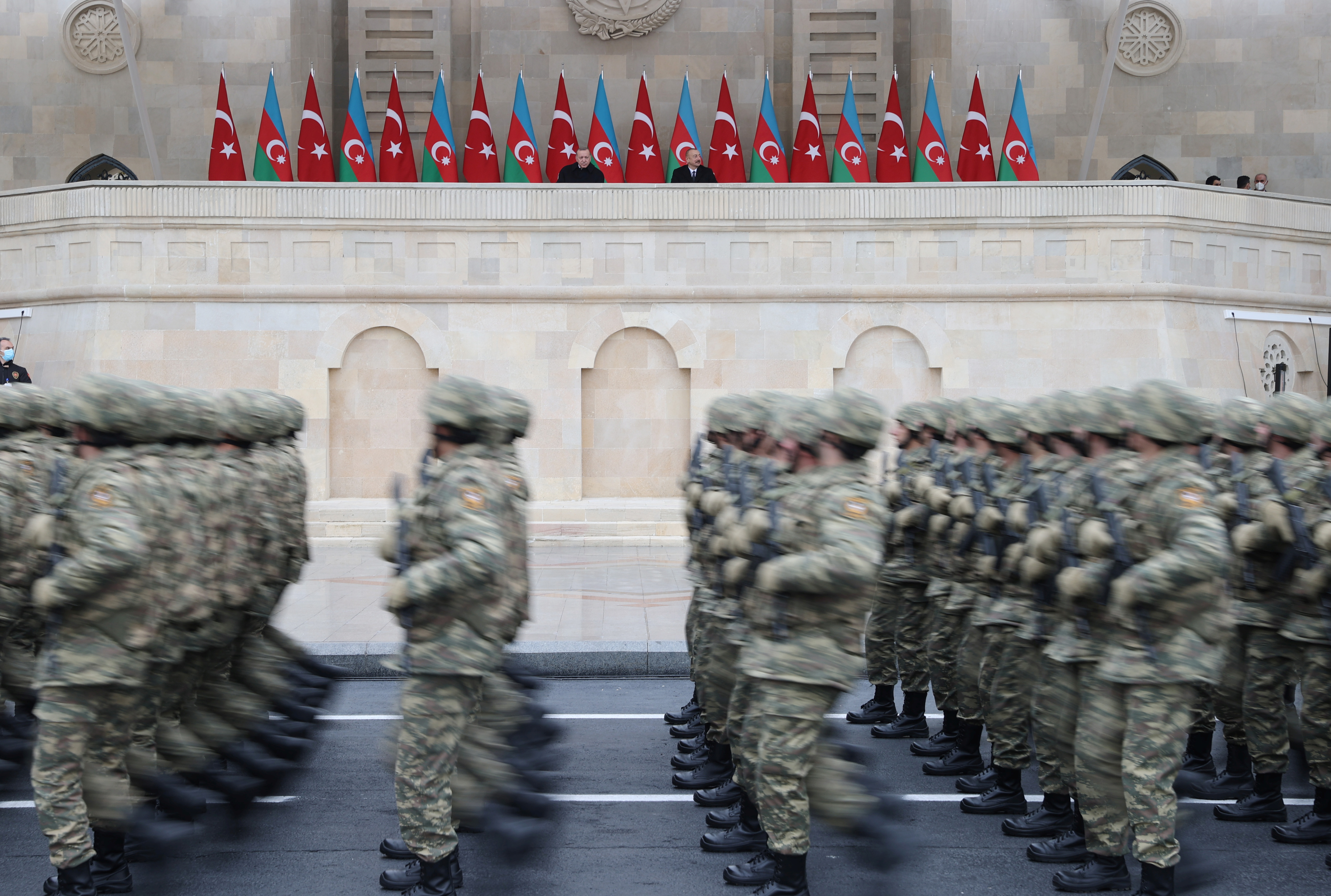 Presidents Tayyip Erdogan of Turkey and Ilham Aliyev of Azerbaijan attend a military parade to mark the victory in the Nagorno-Karabakh conflict, in Baku, Azerbaijan, December 10, 2020