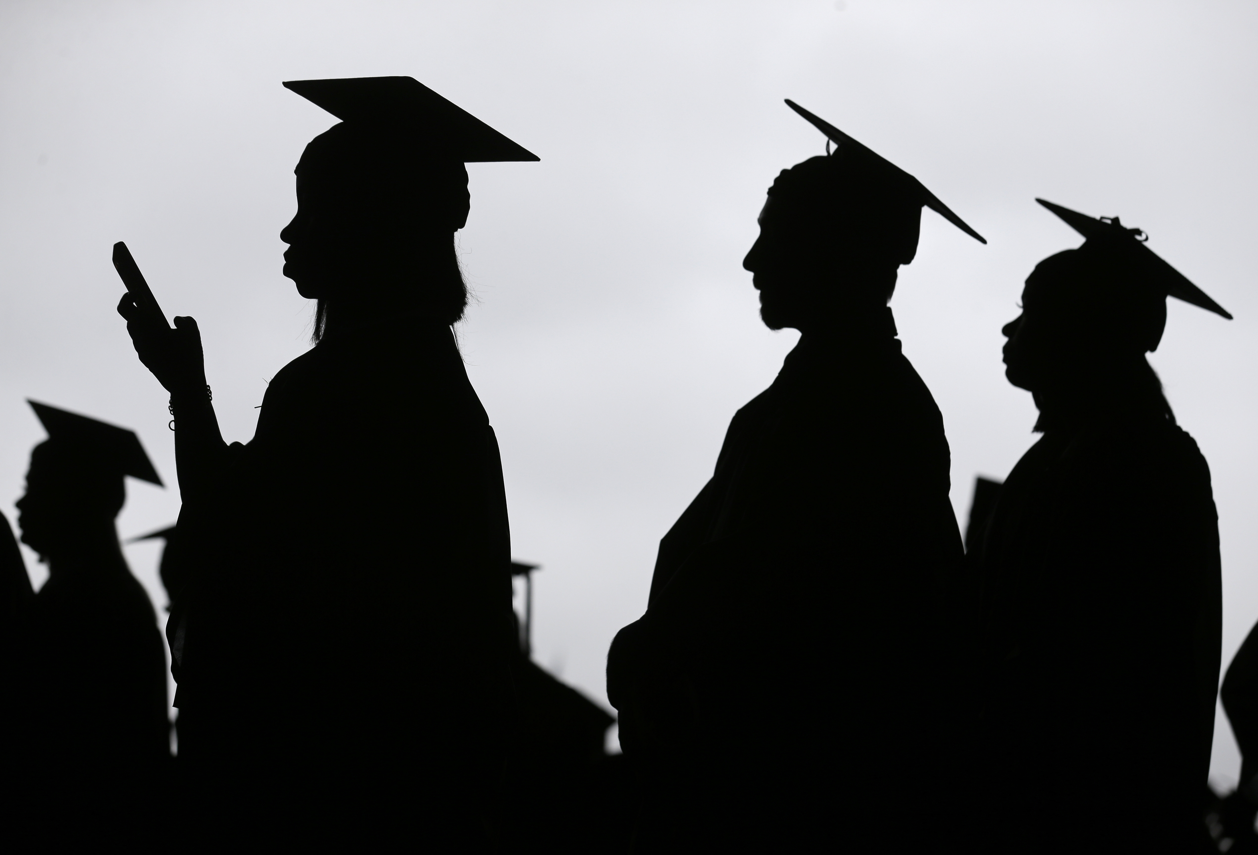 Americans owe $1.7 trillion in student loan debt, according to Federal Reserve data, and many borrowers feel the temporary freeze on federal student loan payments and interest during the COVID-19 crisis is not enough [File: Seth Wenig/AP Photo]