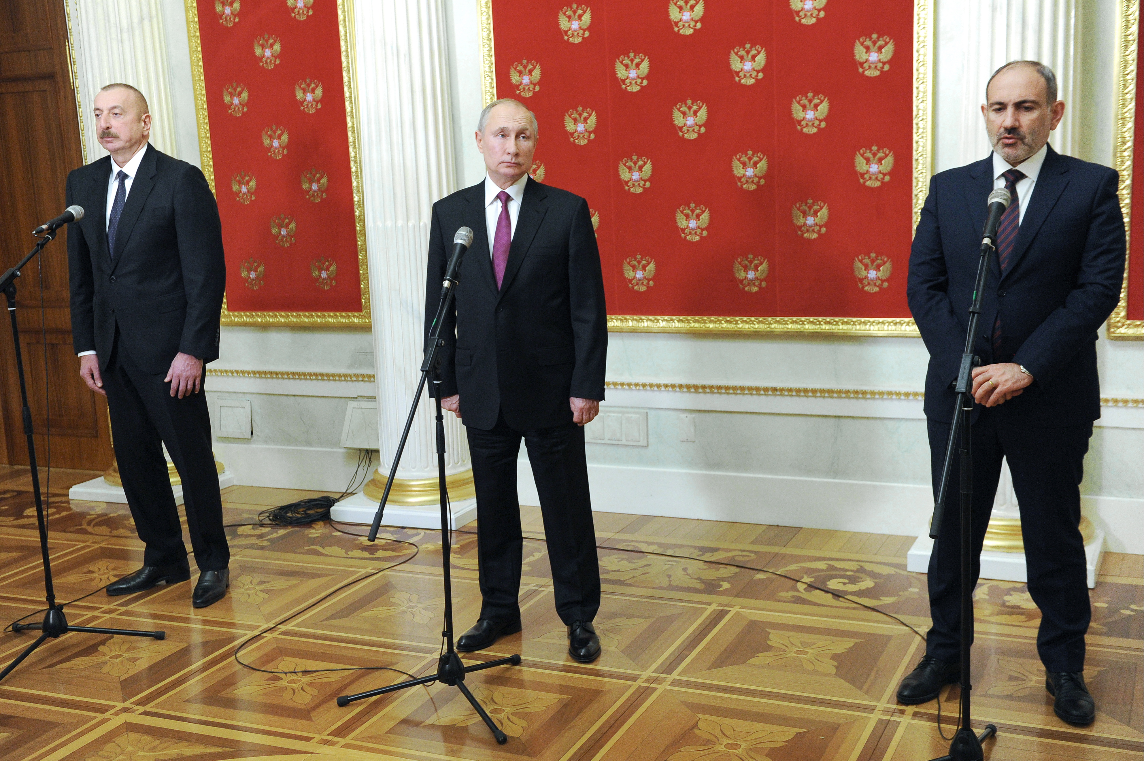 Azerbaijan's President Ilham Aliyev, Russia's President Vladimir Putin, and Armenia's Prime Minister Nikol Pashinyan during a press conference following a trilateral meeting at the Kremlin in Moscow, Russia [Mikhail Klimentyev/TASS via Getty Images]