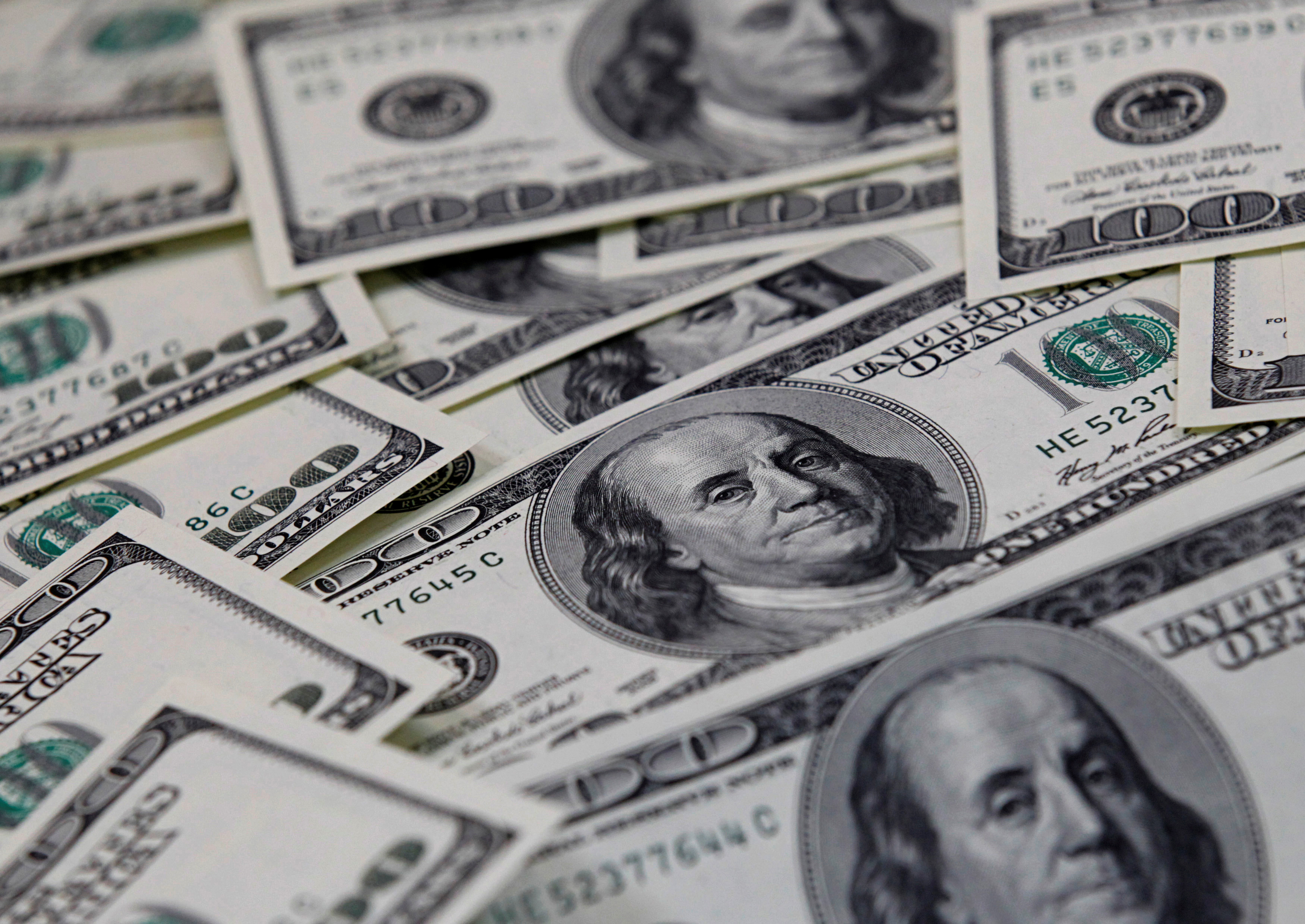 Two United States-based efforts are exploring the concept of a digital fiat dollar in an era when cash isn’t king anymore [File: Lee Jae-Won/Reuters]