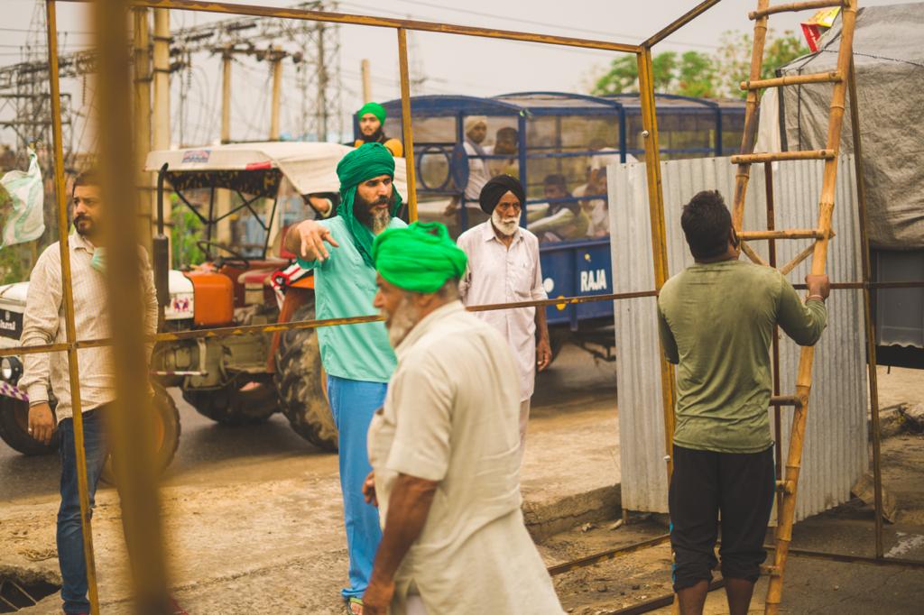 Dr Singh, second from left, with the farmers at Tikri outside New Delhi [Courtesy: Dr Swaiman Singh]