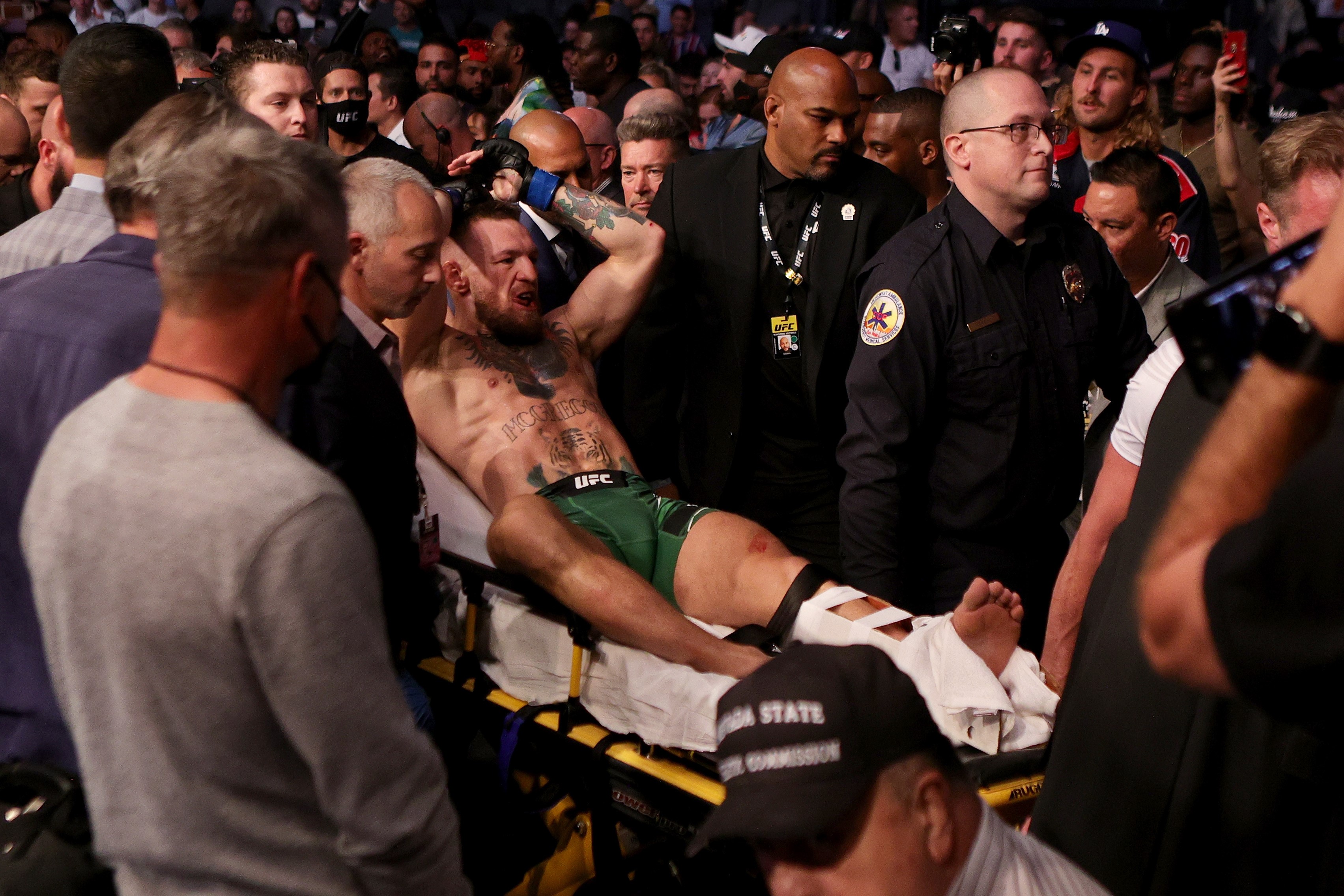 The fight was stopped after the first-round bell when McGregor was unable to continue