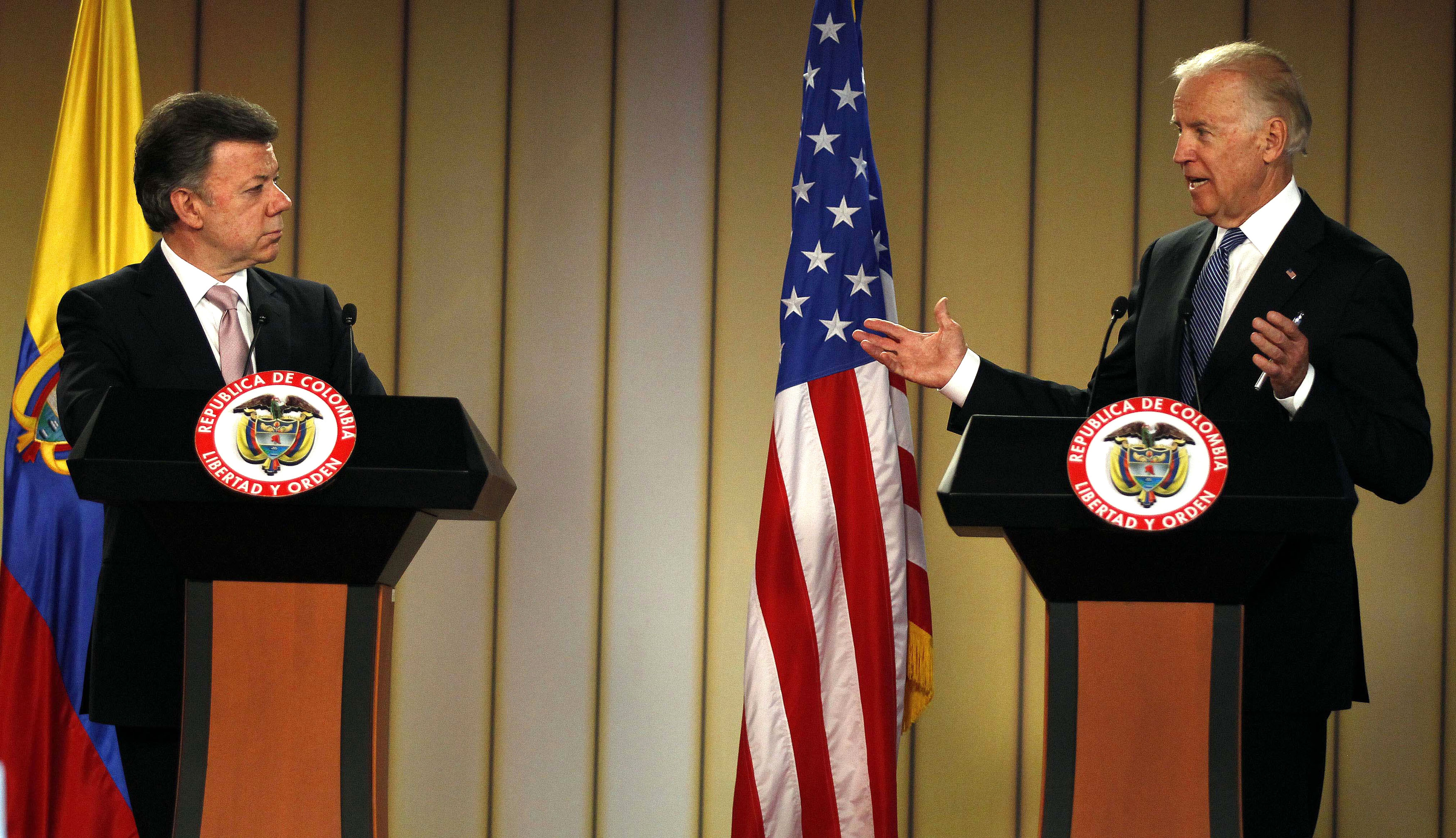 Vice President Joe Biden, right, speaks during a joint press conference with Colombia’s President Juan Manuel Santos at the presidential palace in Bogota, May 27, 2013