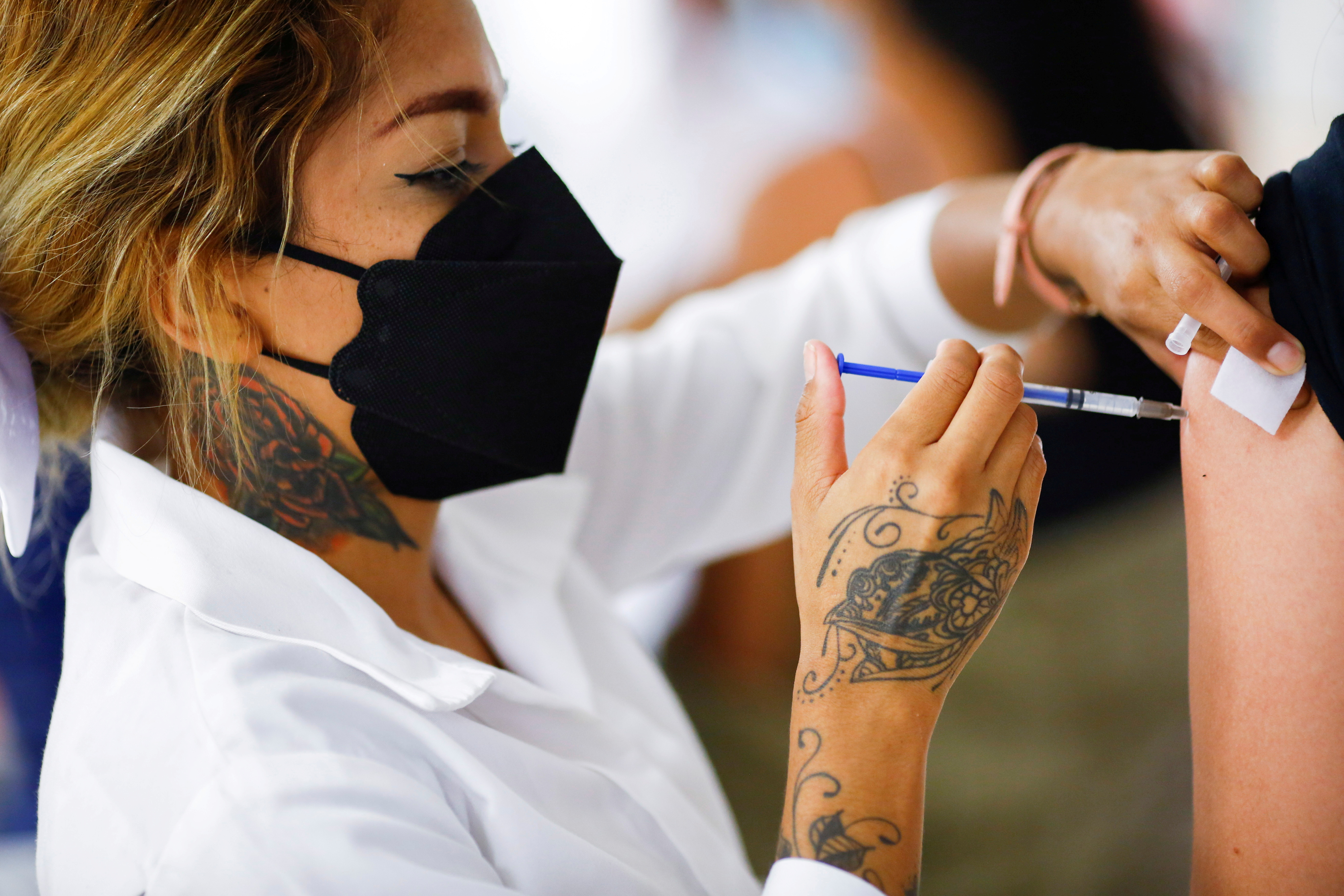 Nurse injects Covid vaccine