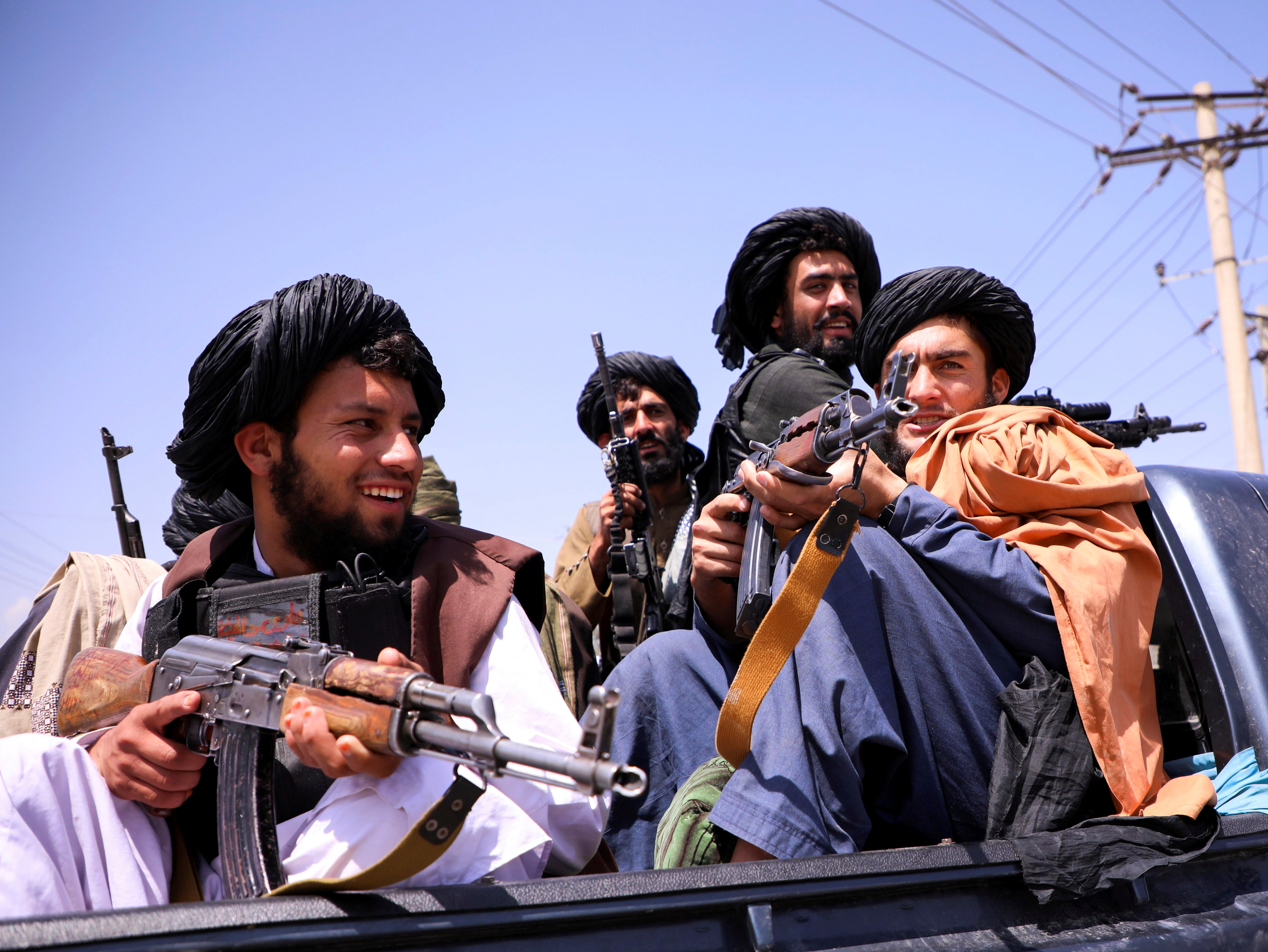 Taliban forces patrol in front of Hamid Karzai International Airport in Kabul, Afghanistan, on September 2