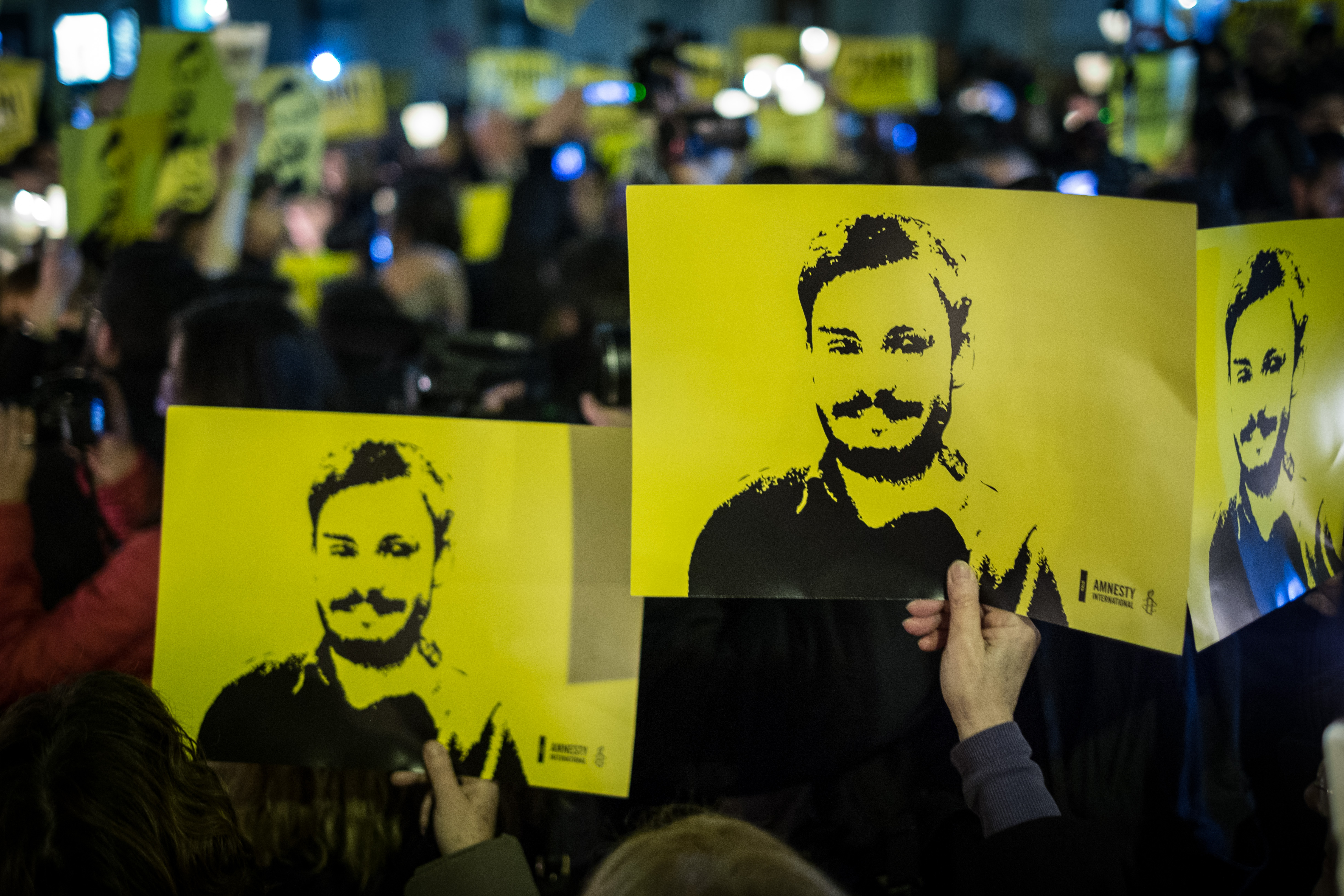 People during a march and torchlight procession in memory of the Italian researcher Giulio Regeni, in Rome, Italy, January 25, 2018