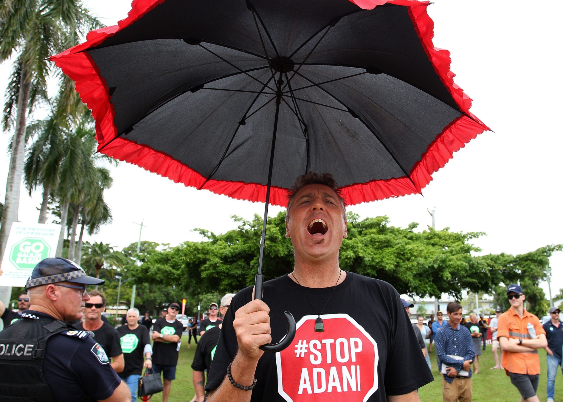 An activist at a rally in Mackay, Queensland in Australia, protesting against the Adani mine