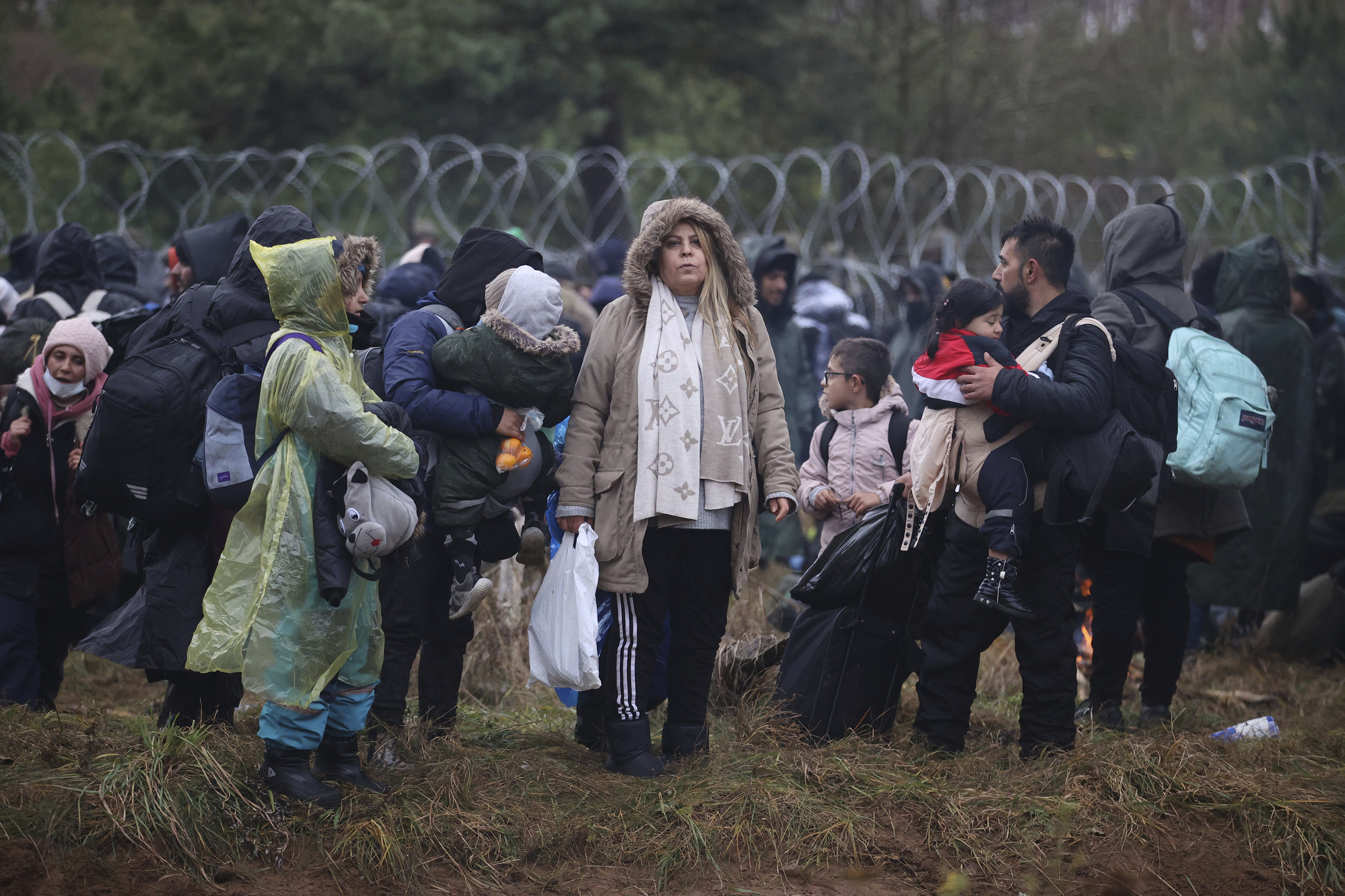 Refugees from the Middle East and elsewhere gather at the Belarus-Poland border near Grodno, Belarus on November 8, 2021