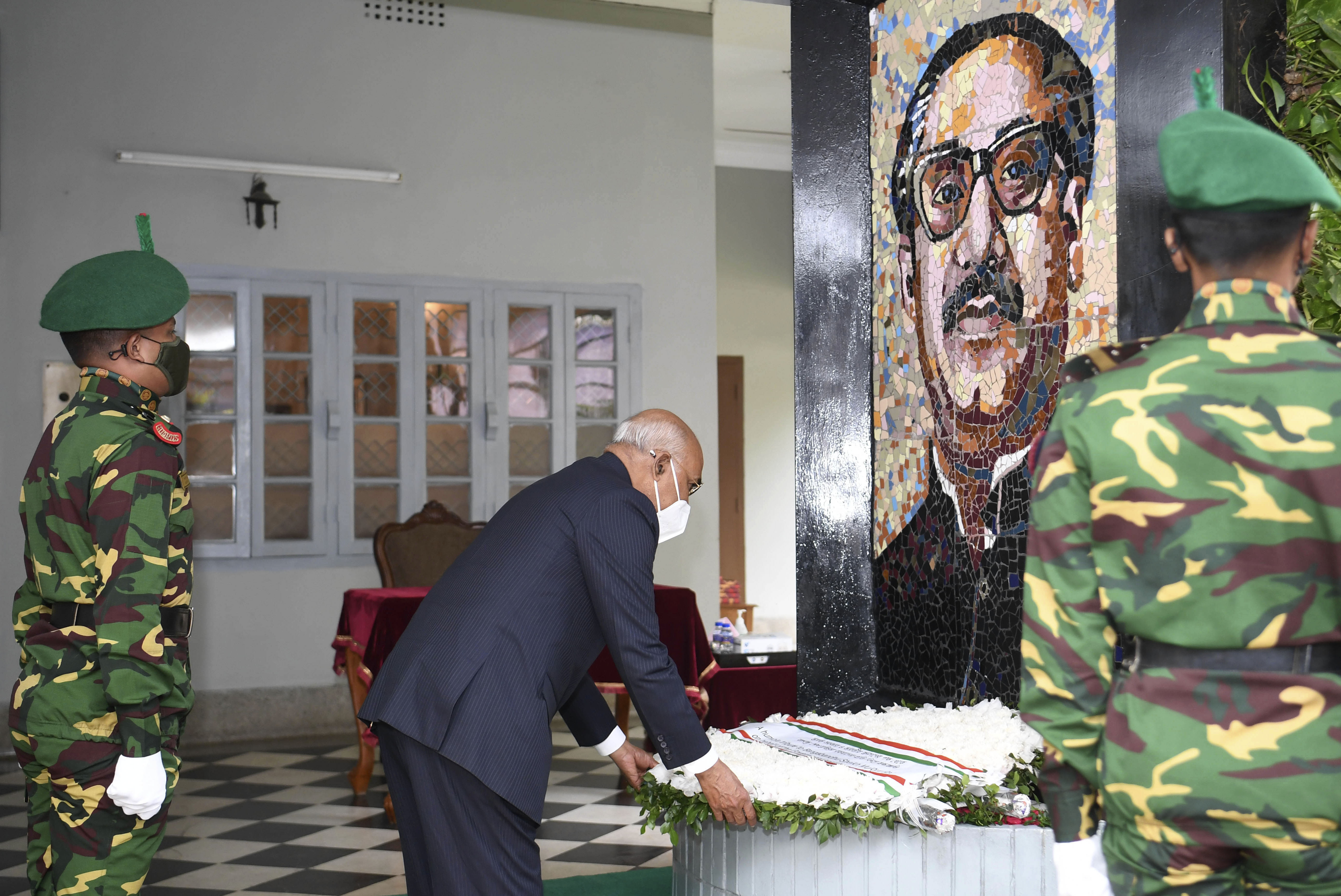 India’s President Ram Nath Kovind pays homage to Bangladeshi independence leader Sheikh Mujibur Rahman at the Bangabandhu Museum in Dhaka [Indian Presidential Palace via AP]