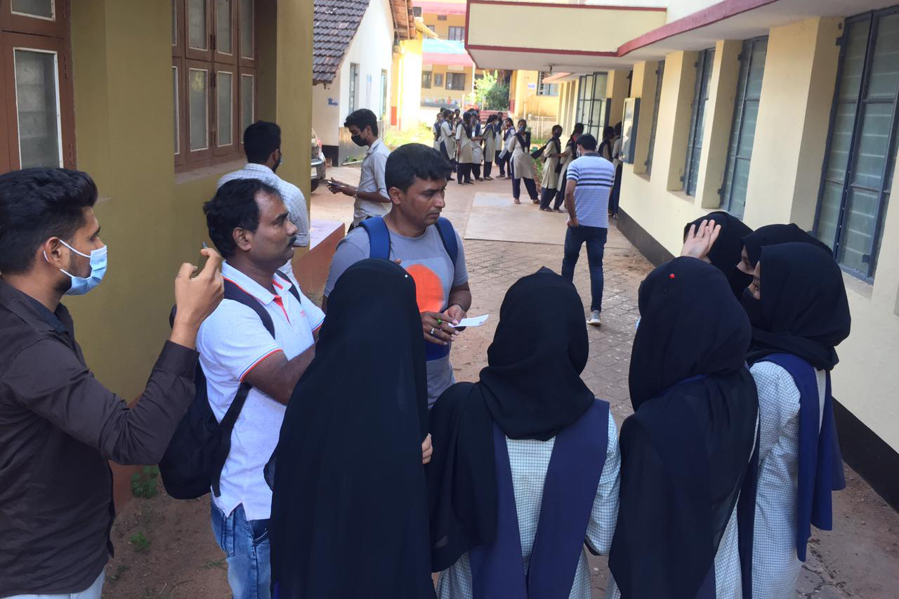 Students interacting with media persons over the ban on Hijab inside classrooms at their college.